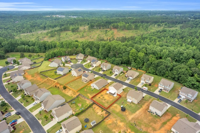 651 Willow Bank, Moore, SC 29369 - aerial view of property and surrounding area featuring a heavily wooded area, nearby suburban area, and property parcel outlined