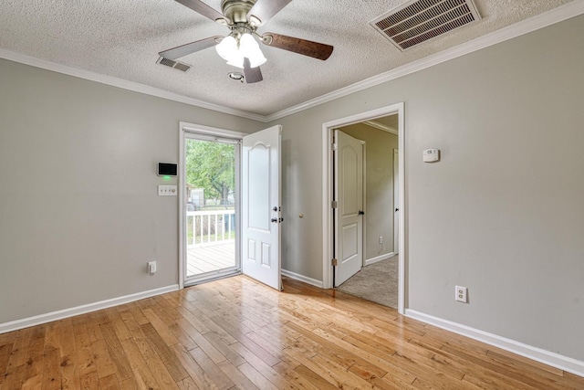 9 Powell, Inman, SC 29349 - unfurnished room featuring a textured ceiling, light wood-type flooring, ceiling fan, ornamental molding, and baseboards