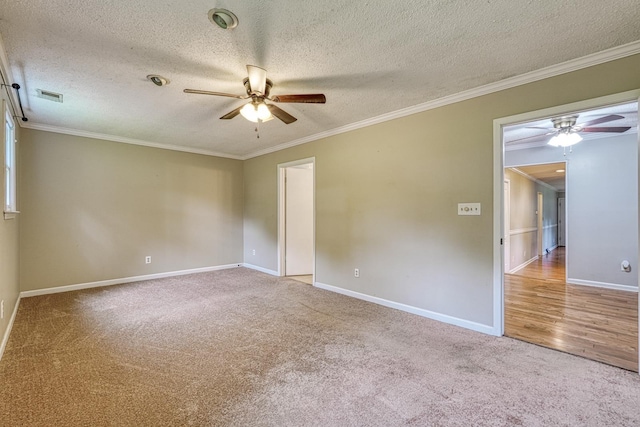 9 Powell, Inman, SC 29349 - unfurnished room with ceiling fan, carpet, ornamental molding, a textured ceiling, and baseboards