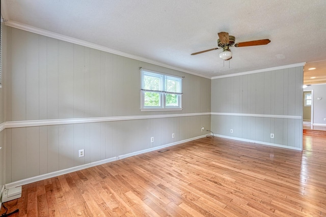 9 Powell, Inman, SC 29349 - unfurnished room featuring ceiling fan, light wood-style flooring, ornamental molding, a textured ceiling, and baseboards