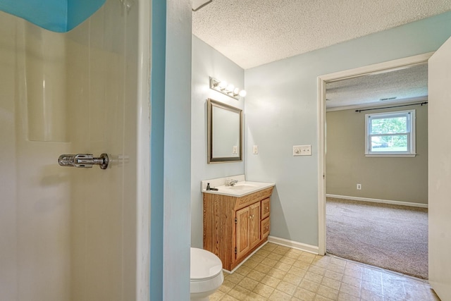 9 Powell, Inman, SC 29349 - bathroom with a textured ceiling, vanity, toilet, baseboards, and a shower
