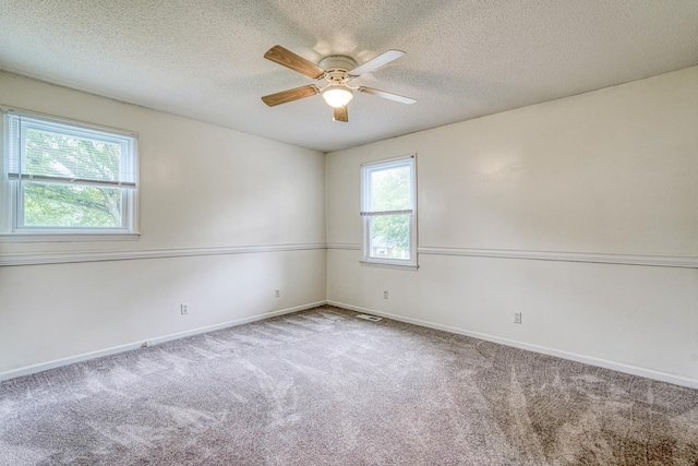 9 Powell, Inman, SC 29349 - carpeted empty room with a ceiling fan, baseboards, and a textured ceiling