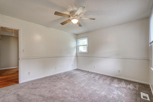 9 Powell, Inman, SC 29349 - carpeted empty room featuring attic access, a ceiling fan, a textured ceiling, and baseboards