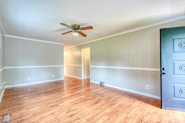9 Powell, Inman, SC 29349 - empty room featuring wood finished floors, ceiling fan, a textured ceiling, ornamental molding, and baseboards