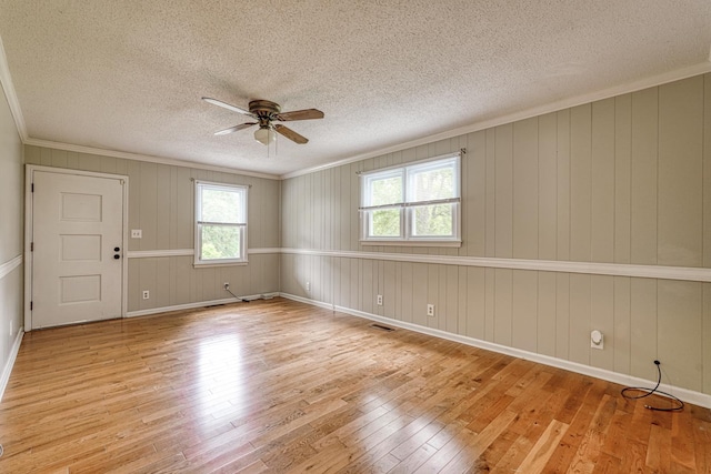 9 Powell, Inman, SC 29349 - spare room with wood-type flooring, ceiling fan, a textured ceiling, and ornamental molding