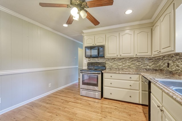 9 Powell, Inman, SC 29349 - kitchen with electric range, black microwave, dishwasher, light wood finished floors, and backsplash