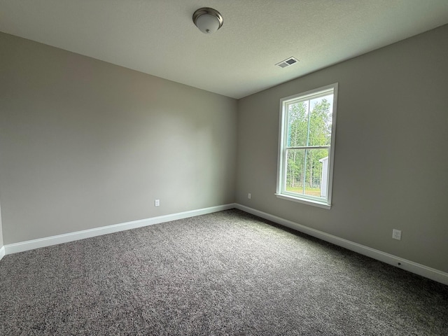 231 Patch, Spartanburg, SC 29302 - unfurnished room featuring baseboards and carpet flooring
