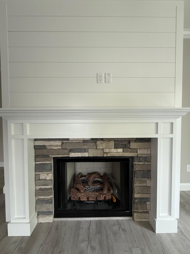 231 Patch, Spartanburg, SC 29302 - detailed view of a stone fireplace, wood finished floors, and baseboards