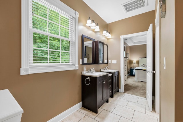 2131 Brockman Mcclimon, Greer, SC 29651 - ensuite bathroom with double vanity, baseboards, and tile patterned flooring