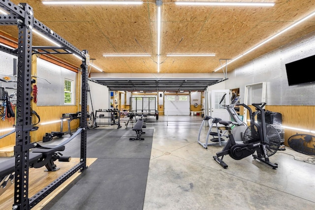 2131 Brockman Mcclimon, Greer, SC 29651 - workout area featuring a garage and wood walls