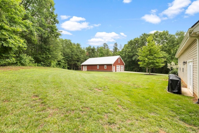 2131 Brockman Mcclimon, Greer, SC 29651 - view of grassy yard with a garage and an outdoor structure