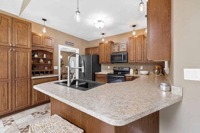 2131 Brockman Mcclimon, Greer, SC 29651 - kitchen with appliances with stainless steel finishes, a peninsula, a sink, and light countertops