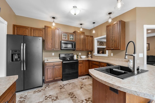 2131 Brockman Mcclimon, Greer, SC 29651 - kitchen featuring stainless steel microwave, fridge with ice dispenser, black electric range oven, brown cabinetry, and light countertops