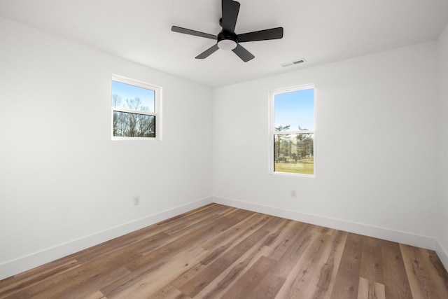 1661 Belcher, Inman, SC 29349 - empty room featuring baseboards, light wood-style floors, and a ceiling fan
