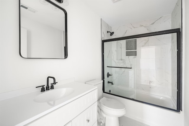 1661 Belcher, Inman, SC 29349 - bathroom with toilet, enclosed tub / shower combo, vanity, and marble look tiles