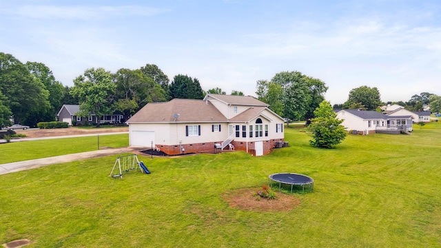 11 Midland, Taylors, SC 29687 - rear view of property featuring a trampoline, driveway, crawl space, a lawn, and a garage