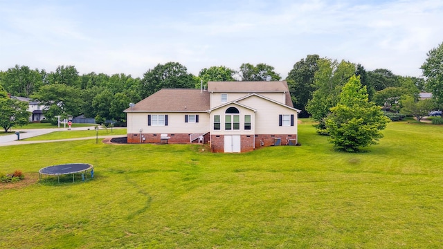 11 Midland, Taylors, SC 29687 - view of side of home featuring crawl space, a trampoline, and a yard