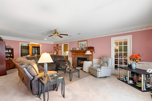 11 Midland, Taylors, SC 29687 - living room with light carpet, a brick fireplace, ceiling fan, and crown molding