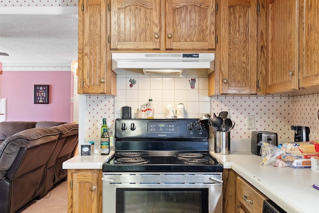 11 Midland, Taylors, SC 29687 - kitchen featuring stainless steel range with electric cooktop, under cabinet range hood, open floor plan, light countertops, and a textured ceiling