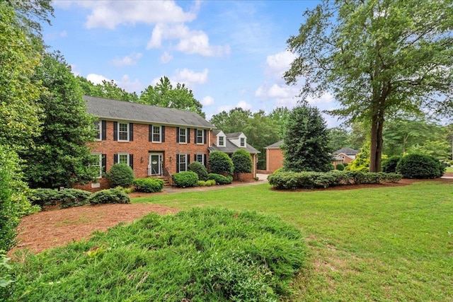 805 Laurel, Spartanburg, SC 29301 - colonial-style house featuring a front lawn and brick siding