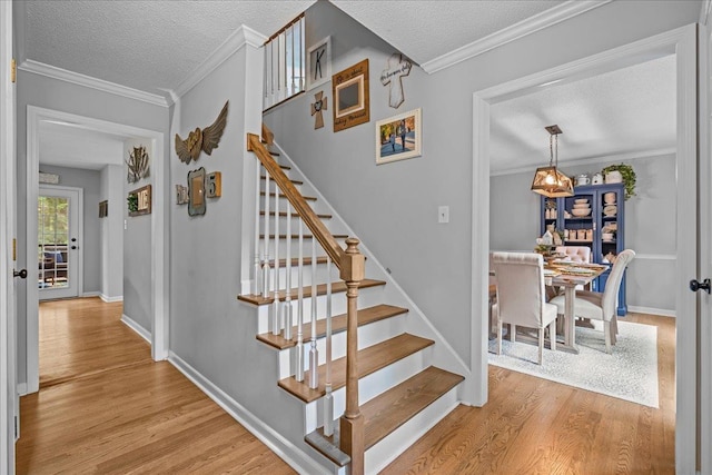 805 Laurel, Spartanburg, SC 29301 - staircase with a textured ceiling, wood finished floors, ornamental molding, and baseboards