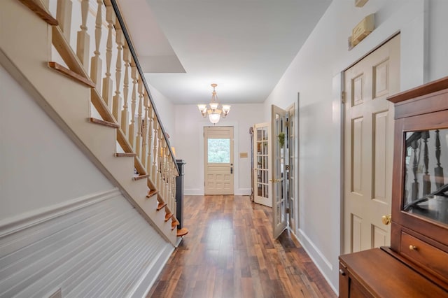 251 W Mcelhaney, Taylors, SC 29687 - foyer entrance featuring stairway, dark wood finished floors, a chandelier, and baseboards