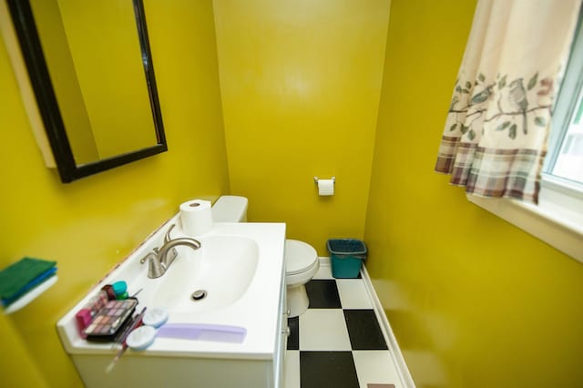 107 Anita, Spartanburg, SC 29302 - bathroom with toilet, tile patterned floors, baseboards, and vanity