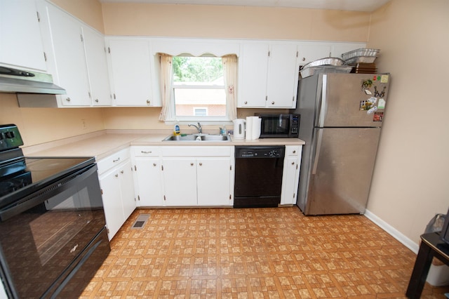 107 Anita, Spartanburg, SC 29302 - kitchen with black appliances, a sink, under cabinet range hood, light countertops, and white cabinetry