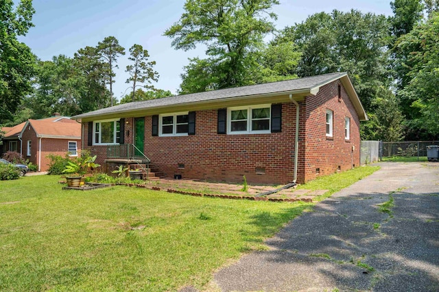 107 Anita, Spartanburg, SC 29302 - view of front of house with crawl space, brick siding, and asphalt driveway