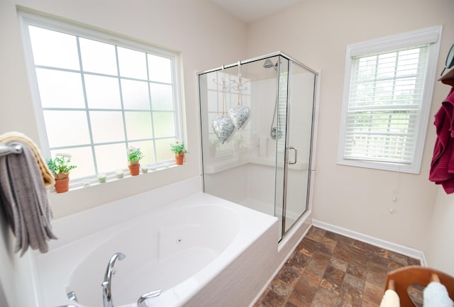 175 Castleton, Boiling Springs, SC 29316 - full bath featuring stone finish floors, a jetted tub, a shower stall, and plenty of natural light