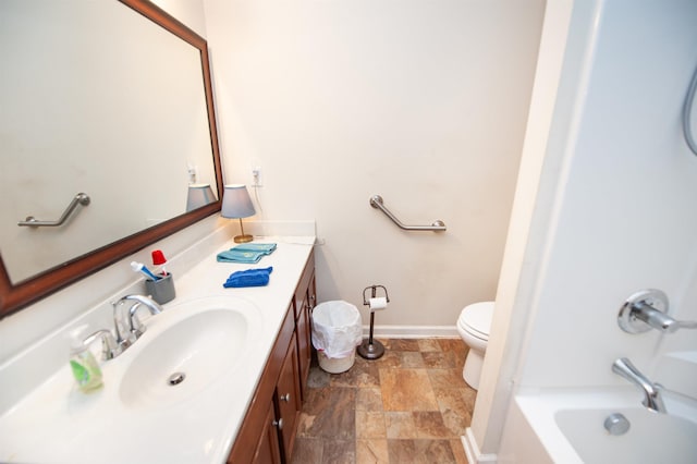 175 Castleton, Boiling Springs, SC 29316 - full bathroom with stone finish flooring, vanity, toilet, baseboards, and bathing tub / shower combination