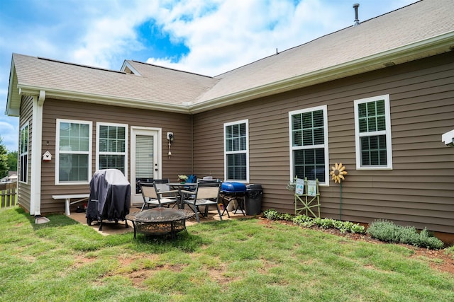 175 Castleton, Boiling Springs, SC 29316 - rear view of house with a fire pit, a lawn, and a patio area