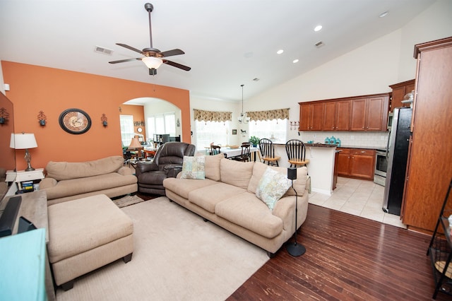 175 Castleton, Boiling Springs, SC 29316 - living area with arched walkways, ceiling fan, vaulted ceiling, light wood-type flooring, and recessed lighting