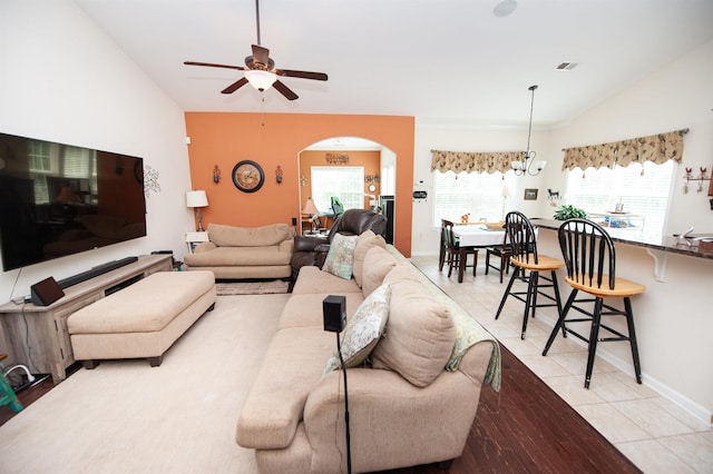175 Castleton, Boiling Springs, SC 29316 - living area featuring vaulted ceiling, arched walkways, ceiling fan, light tile patterned floors, and baseboards
