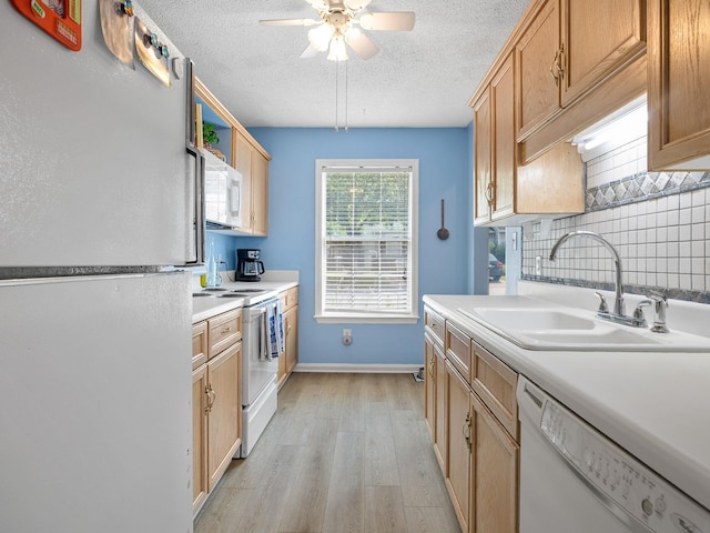 1156 Webber, Spartanburg, SC 29307 - kitchen featuring white appliances, a sink, a textured ceiling, light wood-style floors, and ceiling fan