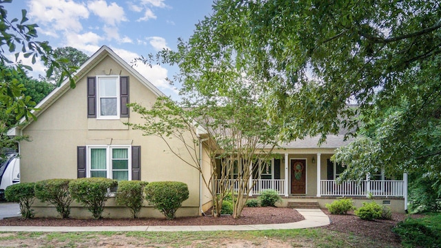 760 Three Wood, Woodruff, SC 29388 - view of front facade featuring a porch and stucco siding