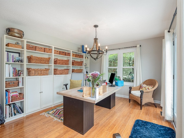 760 Three Wood, Woodruff, SC 29388 - office area with a chandelier and light wood finished floors