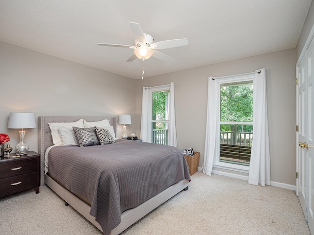 760 Three Wood, Woodruff, SC 29388 - bedroom featuring light carpet, a ceiling fan, baseboards, and access to exterior