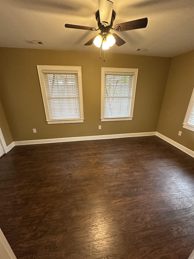 221 Mill, Gaffney, SC 29341 - unfurnished room featuring ceiling fan, dark wood-type flooring, and baseboards