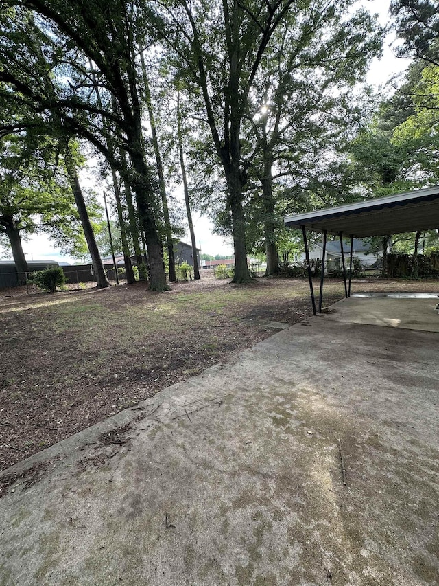 221 Mill, Gaffney, SC 29341 - view of yard featuring a detached carport and driveway
