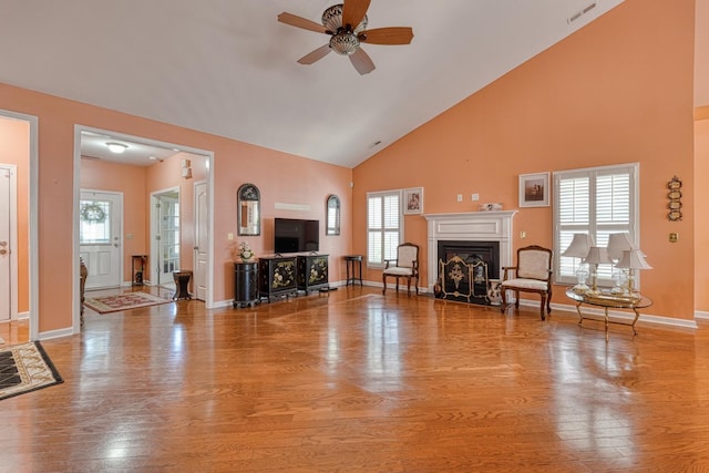 427 Listrac, Moore, SC 29369 - living room featuring a fireplace, ceiling fan, high vaulted ceiling, wood finished floors, and baseboards