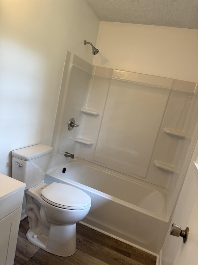 213 Loring, Spartanburg, SC 29302 - full bathroom with wood finished floors, toilet, shower / bathtub combination, vanity, and a textured ceiling