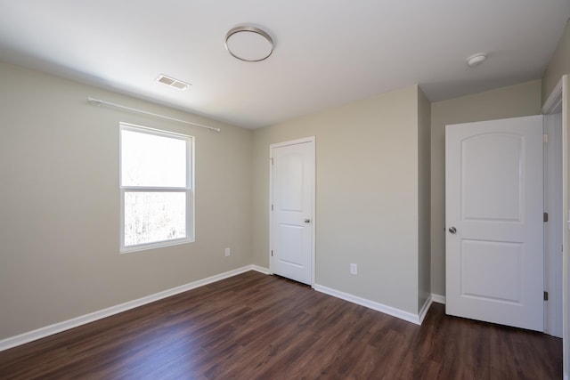 170 Old Timber, Woodruff, SC 29388 - unfurnished bedroom with dark wood-style flooring and baseboards