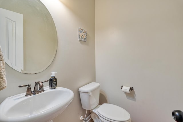 514 Millervale, Greer, SC 29650 - bathroom featuring a sink, toilet, and baseboards