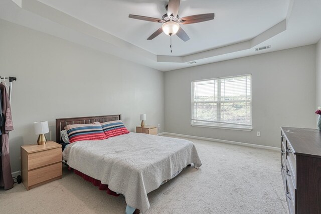 514 Millervale, Greer, SC 29650 - bedroom with light colored carpet, a raised ceiling, baseboards, and ceiling fan