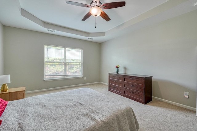 514 Millervale, Greer, SC 29650 - bedroom with light colored carpet, a raised ceiling, baseboards, and ceiling fan
