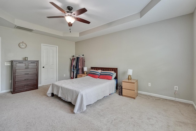 514 Millervale, Greer, SC 29650 - carpeted bedroom featuring baseboards, a tray ceiling, and a ceiling fan