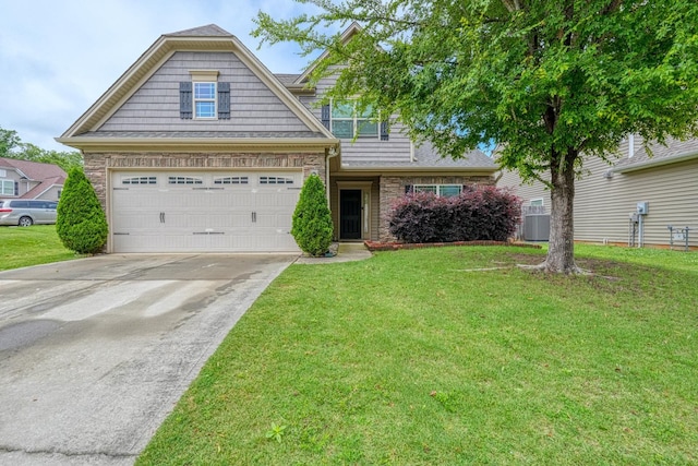 514 Millervale, Greer, SC 29650 - view of front facade featuring driveway, a front yard, and central AC