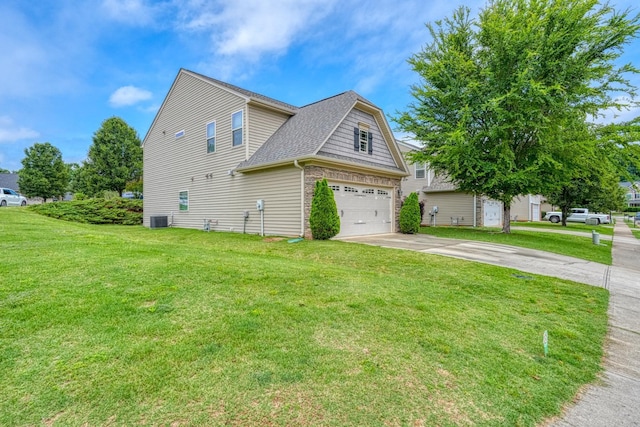 514 Millervale, Greer, SC 29650 - view of home's exterior featuring driveway, central AC, a garage, a yard, and a shingled roof