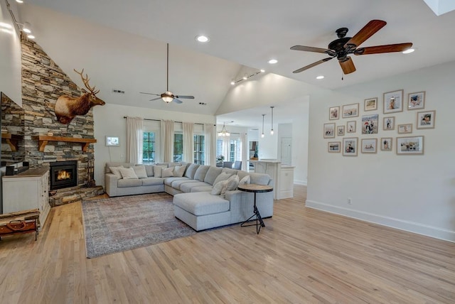 355 Night Lark, Campobello, SC 29322 - living room with a ceiling fan, light wood finished floors, a stone fireplace, baseboards, and recessed lighting